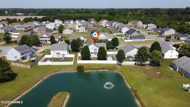 aerial view featuring a residential view and a water view
