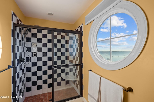 bathroom featuring a stall shower