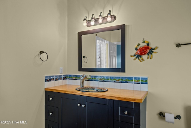 bathroom with backsplash and vanity
