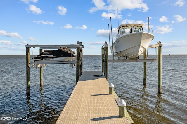 view of dock with a water view and boat lift