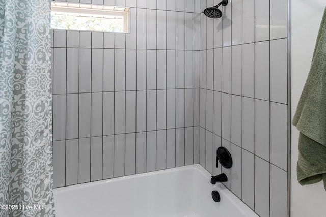 full bath featuring shower / bath combination