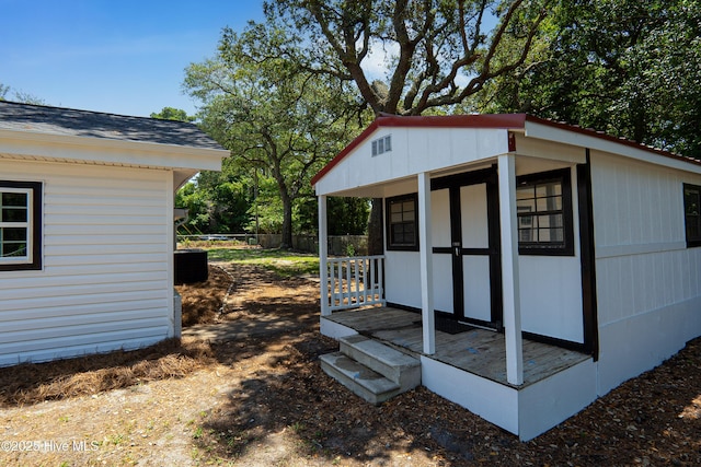 view of outdoor structure with an outdoor structure and fence