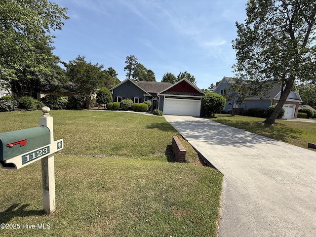 1123 Mill Run Rd, Sneads Ferry, NC 28460 - ranch-style house featuring an attached garage, driveway, and a front yard