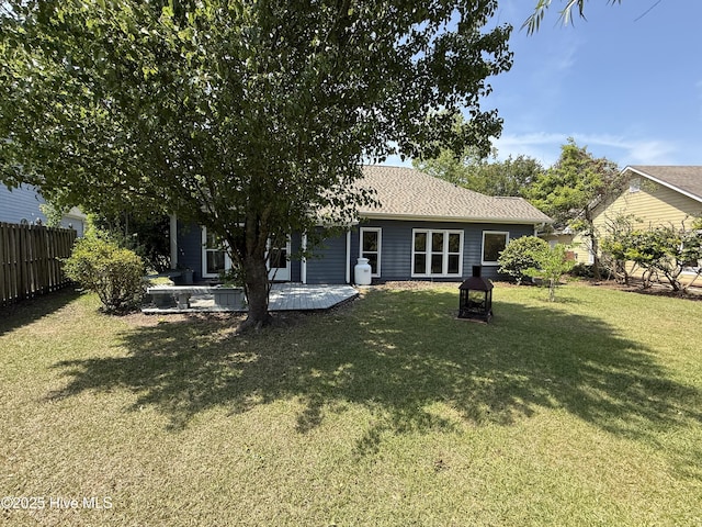 1123 Mill Run Rd, Sneads Ferry, NC 28460 - rear view of property with a lawn and fence