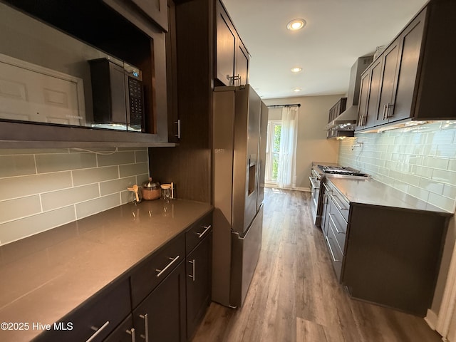 1123 Mill Run Rd, Sneads Ferry, NC 28460 - kitchen featuring backsplash, dark wood-style flooring, appliances with stainless steel finishes, and recessed lighting