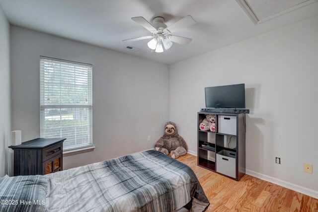 1414 Kellum Ct, Wilmington, NC 28412 - bedroom with wood finished floors, baseboards, and a ceiling fan