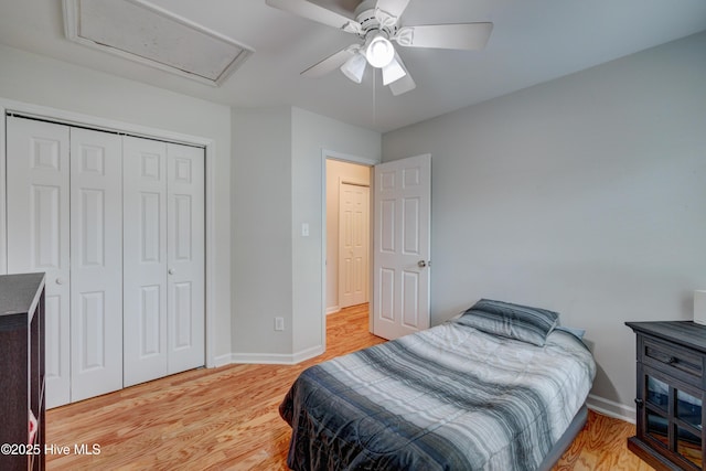 1414 Kellum Ct, Wilmington, NC 28412 - bedroom featuring light wood finished floors, a closet, baseboards, and a ceiling fan