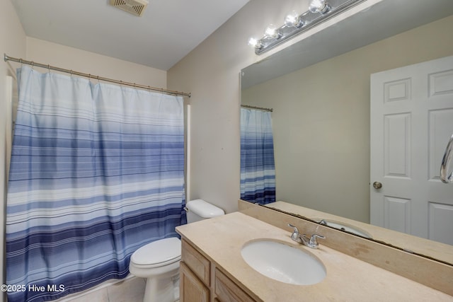 1414 Kellum Ct, Wilmington, NC 28412 - full bathroom with toilet, vanity, tile patterned floors, and a shower with shower curtain