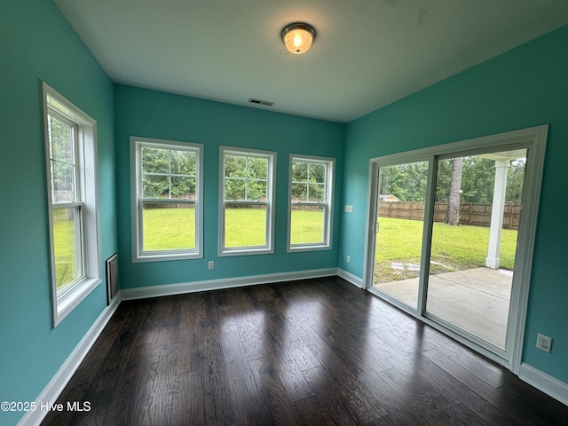 427 Wolfe Ln, Hubert, NC 28539 - spare room featuring baseboards and dark wood-style flooring