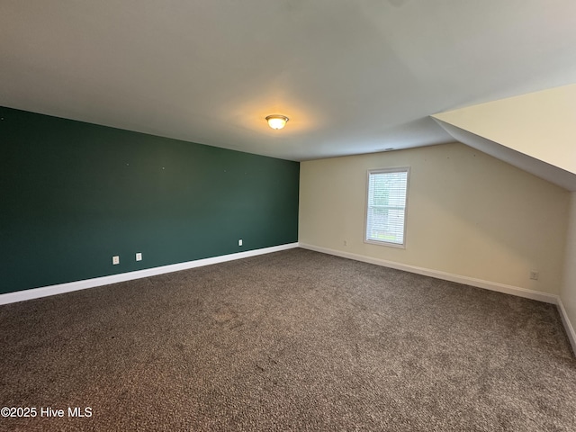 427 Wolfe Ln, Hubert, NC 28539 - bonus room featuring dark carpet and baseboards