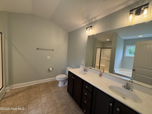 427 Wolfe Ln, Hubert, NC 28539 - full bath featuring a shower stall, a garden tub, double vanity, and lofted ceiling