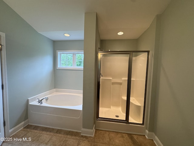 427 Wolfe Ln, Hubert, NC 28539 - bathroom featuring a stall shower and a bath
