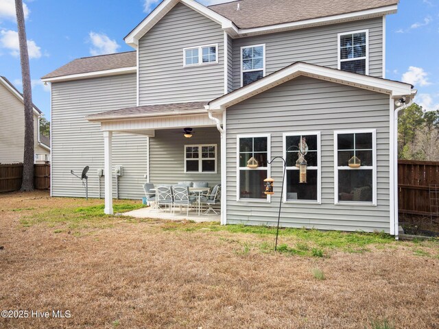 427 Wolfe Ln, Hubert, NC 28539 - back of property with a patio area and roof with shingles