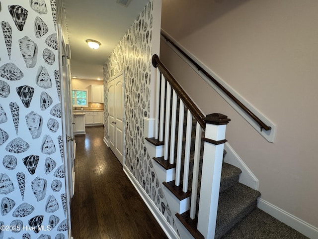 427 Wolfe Ln, Hubert, NC 28539 - staircase featuring wood finished floors and baseboards