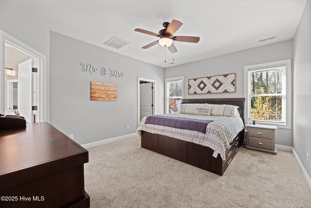214 Green Trees Dr, New Bern, NC 28560 - bedroom with carpet floors, visible vents, and multiple windows
