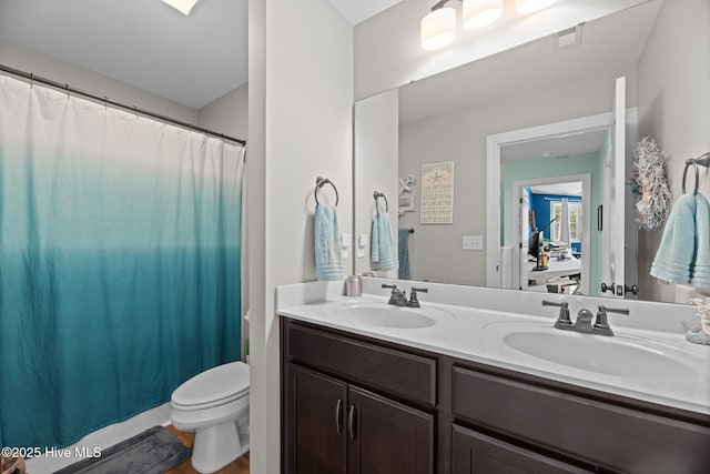214 Green Trees Dr, New Bern, NC 28560 - full bath with double vanity, toilet, a sink, and wood finished floors