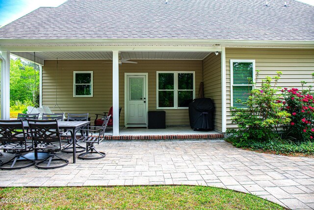 214 Green Trees Dr, New Bern, NC 28560 - view of patio with fence, ceiling fan, an outdoor living space, and outdoor dining space