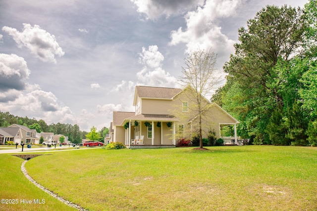 214 Green Trees Dr, New Bern, NC 28560 - view of front of property with a porch and a front lawn