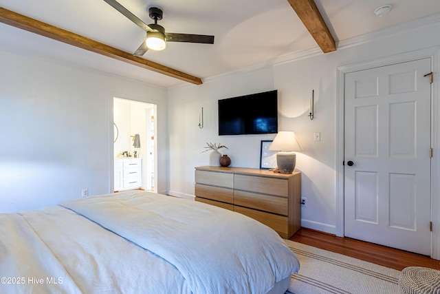 bedroom featuring beamed ceiling, baseboards, ceiling fan, and wood finished floors