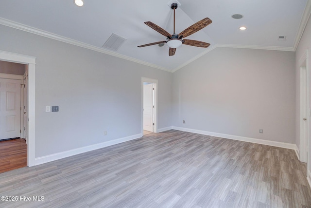 unfurnished bedroom with baseboards, vaulted ceiling, and light wood-style flooring