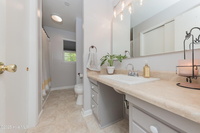 203 Mercer Rd, Jacksonville, NC 28546 - bathroom featuring vanity, toilet, tile patterned flooring, baseboards, and curtained shower