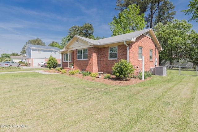 203 Mercer Rd, Jacksonville, NC 28546 - ranch-style house featuring brick siding and cooling unit