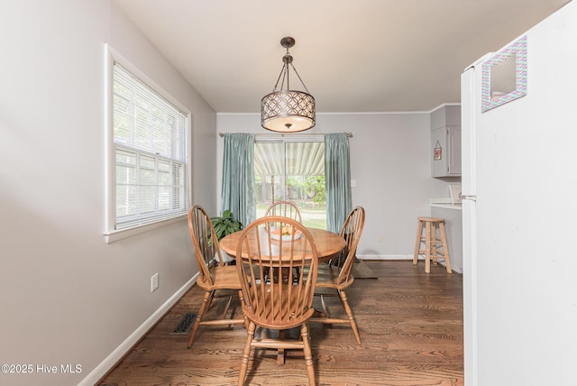 203 Mercer Rd, Jacksonville, NC 28546 - dining area featuring wood finished floors and baseboards