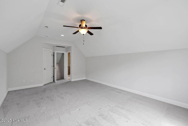 bonus room featuring ceiling fan, baseboards, lofted ceiling, and visible vents