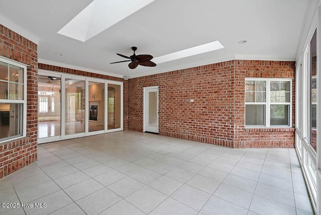 view of patio featuring ceiling fan