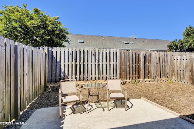 5006 Carleton Dr Unit 141, Wilmington, NC 28403 - fenced backyard with a patio
