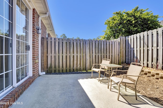 5006 Carleton Dr Unit 141, Wilmington, NC 28403 - fenced backyard featuring a patio
