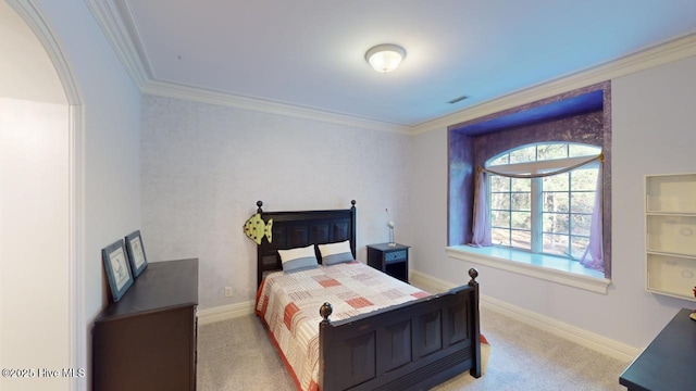 bedroom featuring crown molding, carpet flooring, visible vents, and baseboards
