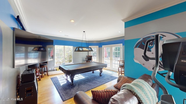 game room with billiards, wood finished floors, recessed lighting, french doors, and crown molding