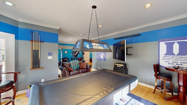 playroom with crown molding, recessed lighting, wood finished floors, and baseboards