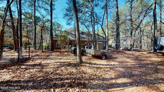 view of yard with fence