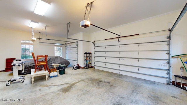 garage featuring a garage door opener