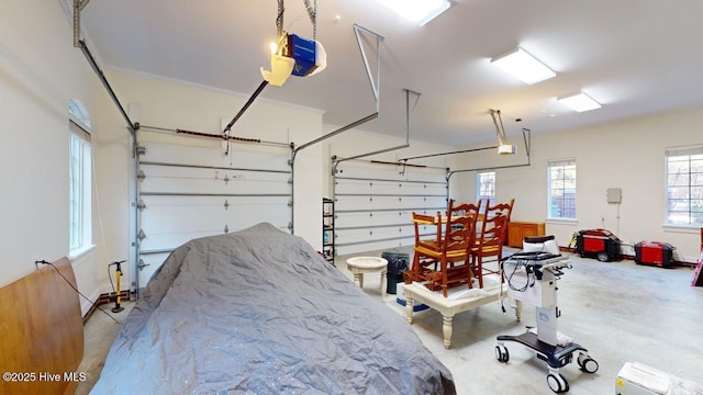 garage featuring a garage door opener