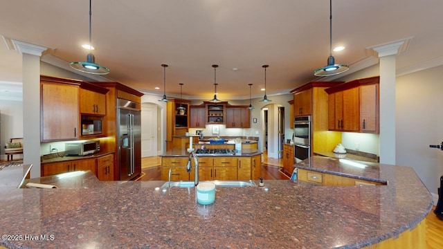 kitchen with open shelves, recessed lighting, stainless steel appliances, arched walkways, and crown molding