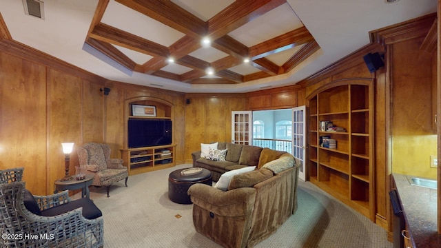 carpeted living room with beam ceiling, wooden walls, coffered ceiling, and visible vents