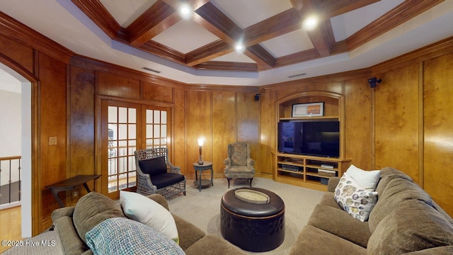 living area featuring visible vents, coffered ceiling, beam ceiling, french doors, and carpet flooring