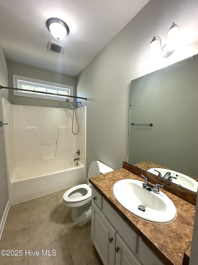 8107 Gentle Breeze Dr, Sims, NC 27880 - bathroom featuring vanity, visible vents, tub / shower combination, tile patterned flooring, and toilet