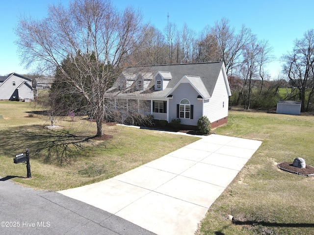 8107 Gentle Breeze Dr, Sims, NC 27880 - new england style home with crawl space, an outdoor structure, a front yard, and a shingled roof