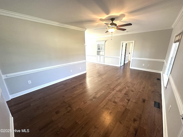 8107 Gentle Breeze Dr, Sims, NC 27880 - empty room featuring visible vents, dark wood-type flooring, baseboards, ornamental molding, and a ceiling fan