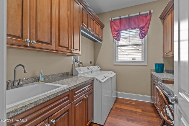 6790 Waterstone Xing SW, Ocean Isle Beach, NC 28469 - laundry area with separate washer and dryer and dark wood-style flooring