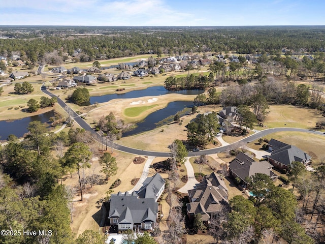 6790 Waterstone Xing SW, Ocean Isle Beach, NC 28469 - aerial view of property and surrounding area featuring nearby suburban area, a nearby body of water, and a golf course