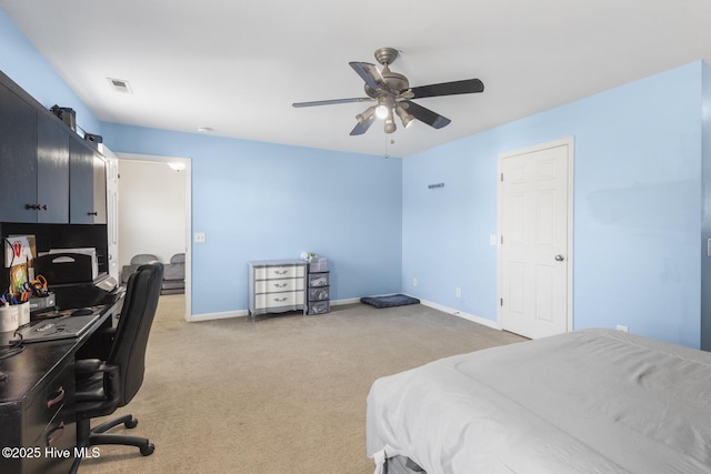 bedroom with light carpet, visible vents, a ceiling fan, and baseboards