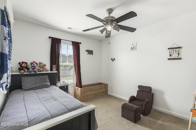 bedroom featuring visible vents, baseboards, carpet, and ceiling fan