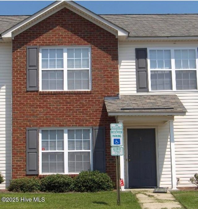 4105 Dudleys Grant Dr Unit E, Winterville, NC 28590 - view of front of home featuring brick siding and a shingled roof