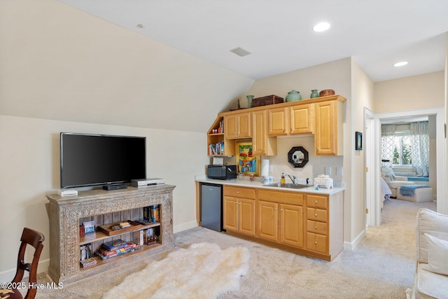kitchen featuring a sink, visible vents, light colored carpet, open shelves, and black microwave
