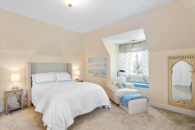 bedroom featuring visible vents, carpet flooring, and baseboards
